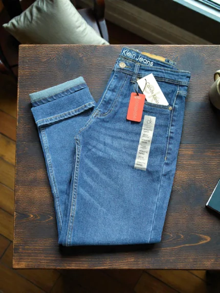Calvin Klein Athletic Taper Medium Blue Stretch Denim Jeans – GHCK2202